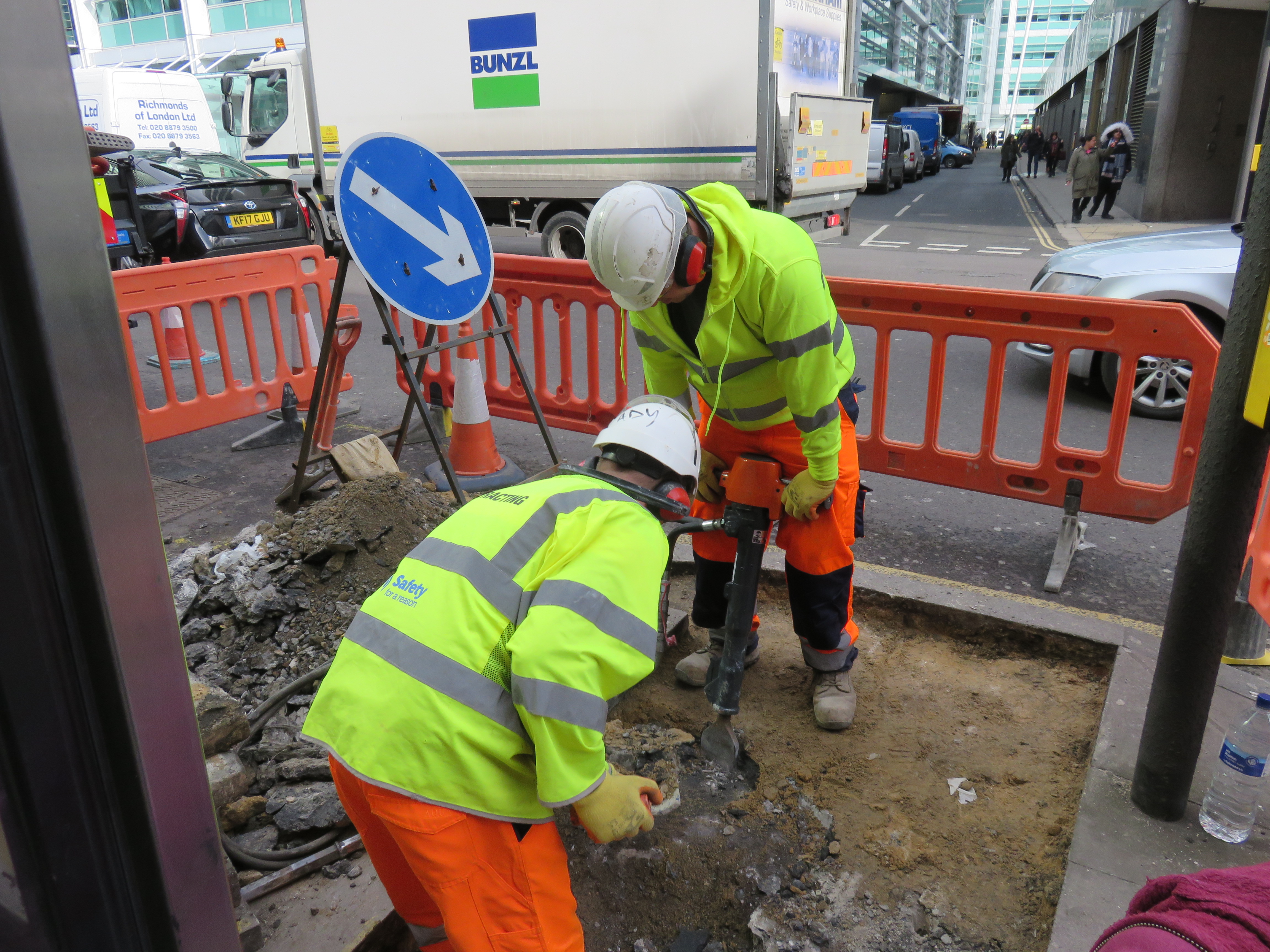 Operatives working on a trial hole